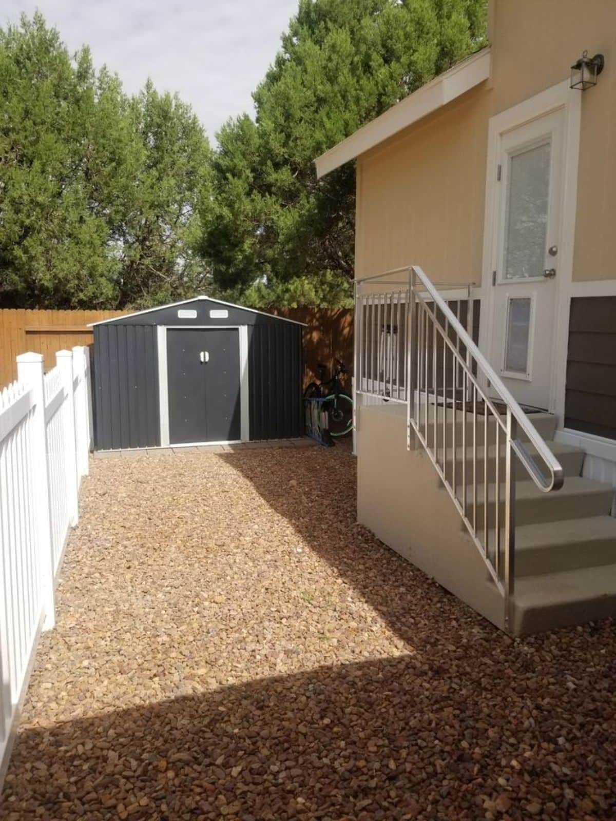 Back gate and additional storage area outside the Spacious Tiny House