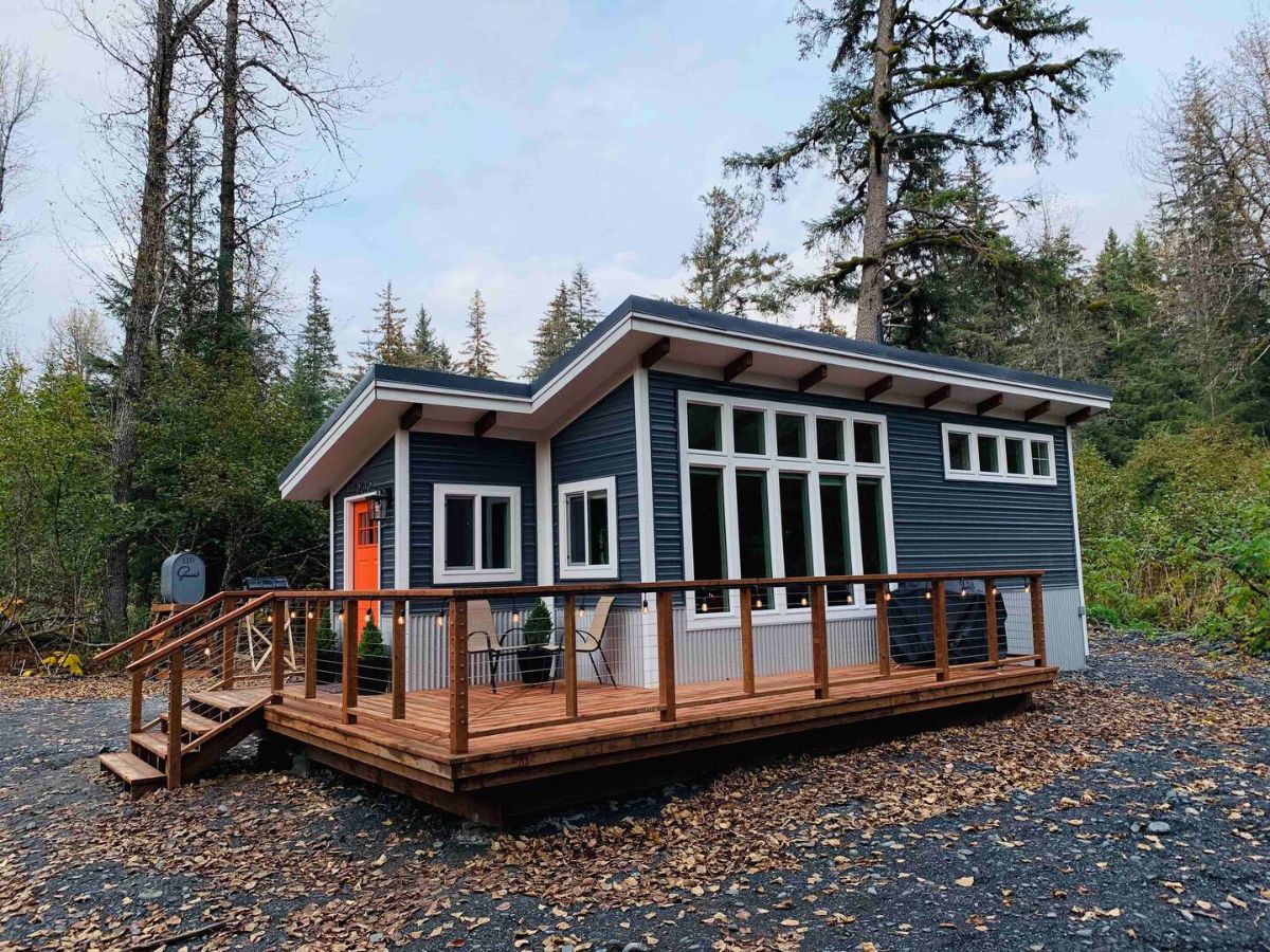 large open porch on side of tiny home