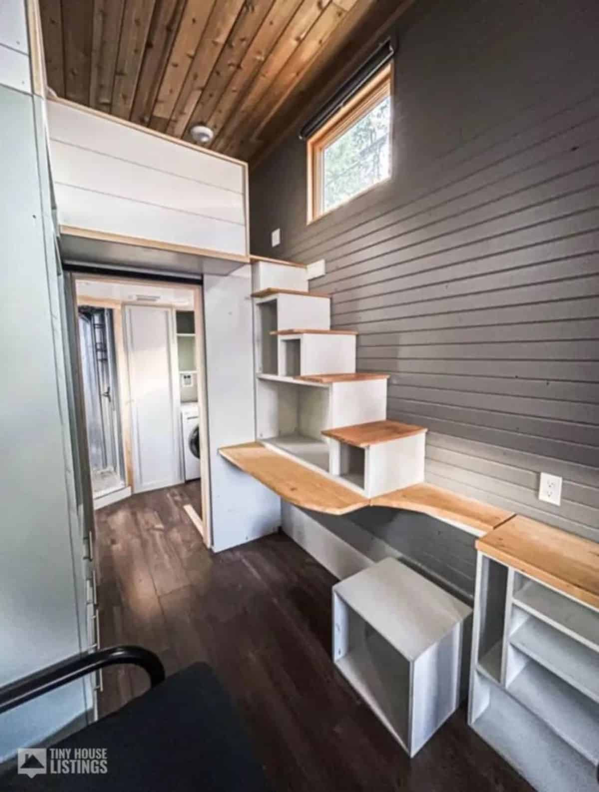 Stairs cum storage space underneath leading to the loft bedroom of Professionally Built 30' Tiny House