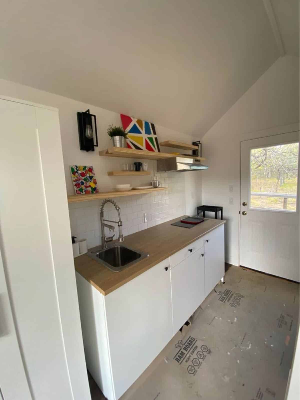 Well organized kitchen area of Tiny Home on Skids
