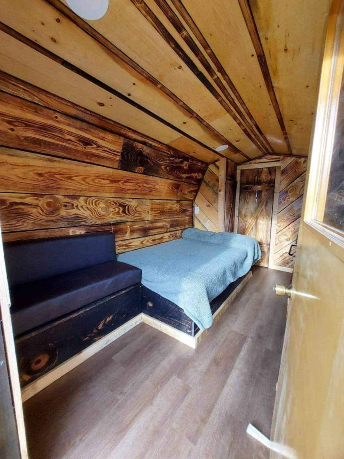 2 Seater couch in living area of tiny home with free delivery