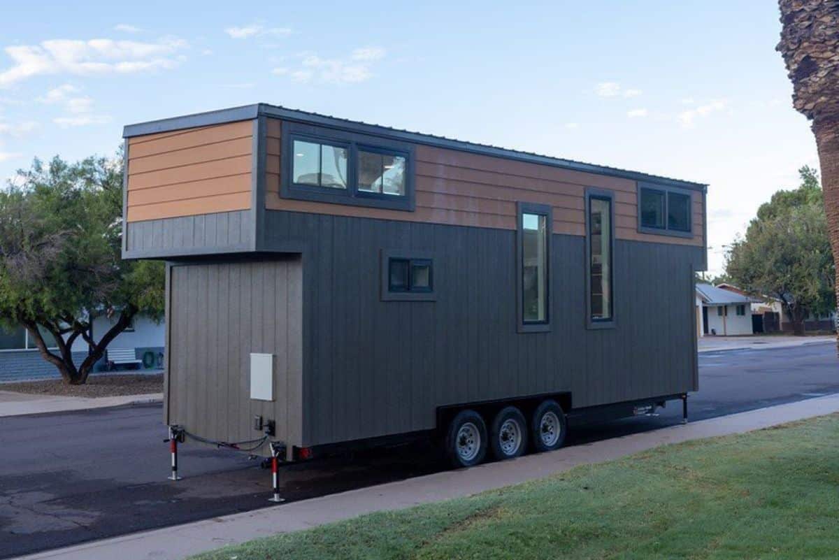 Classic black and brown colored exterior of Tiny House with a Loft