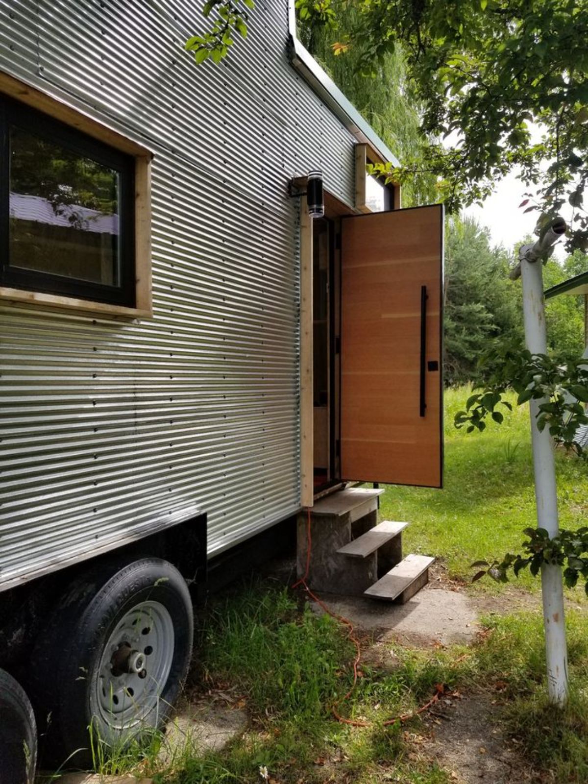 Main entrance view of Tiny Trailer Home