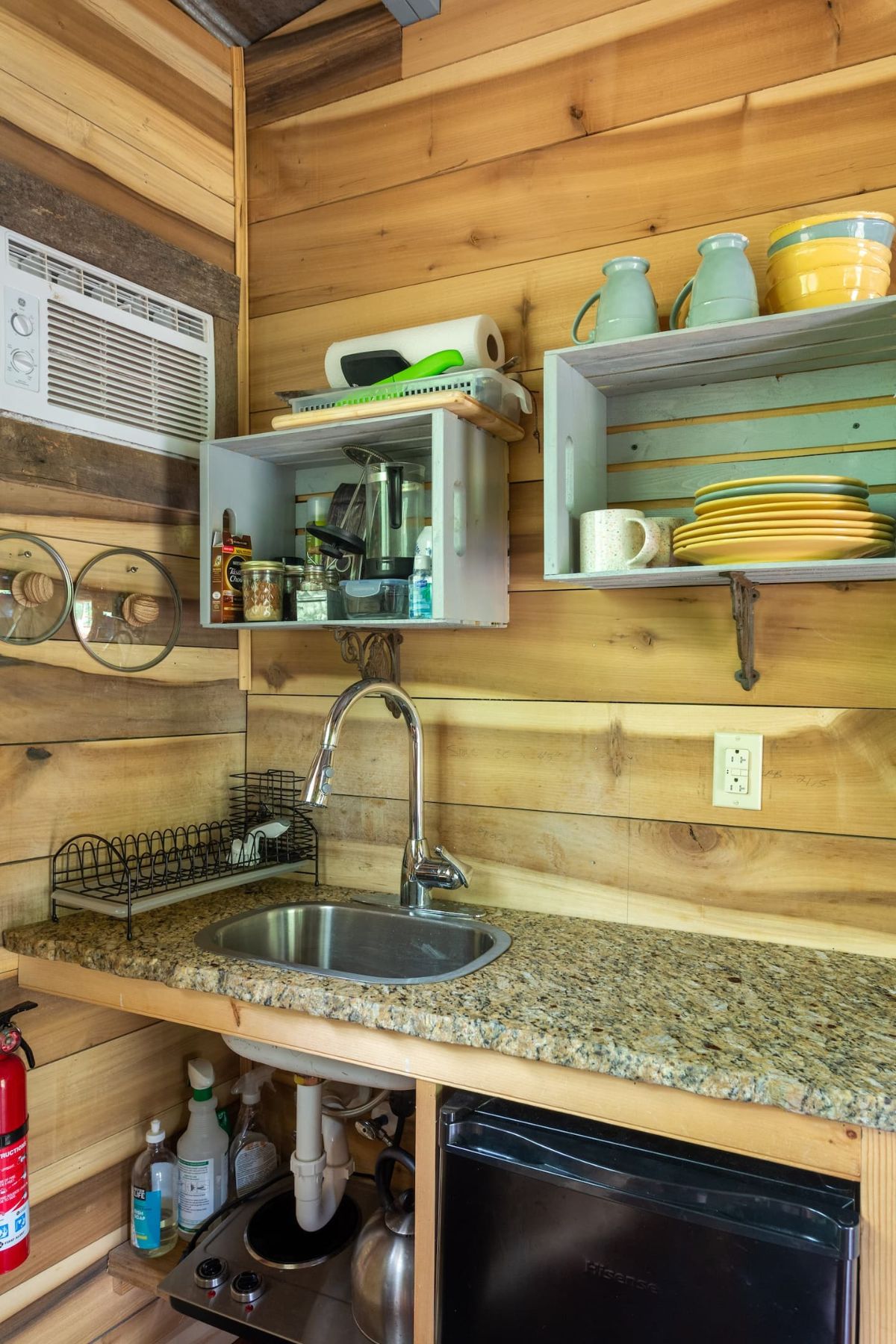 kitchenette with stainless steel sink in treehouse