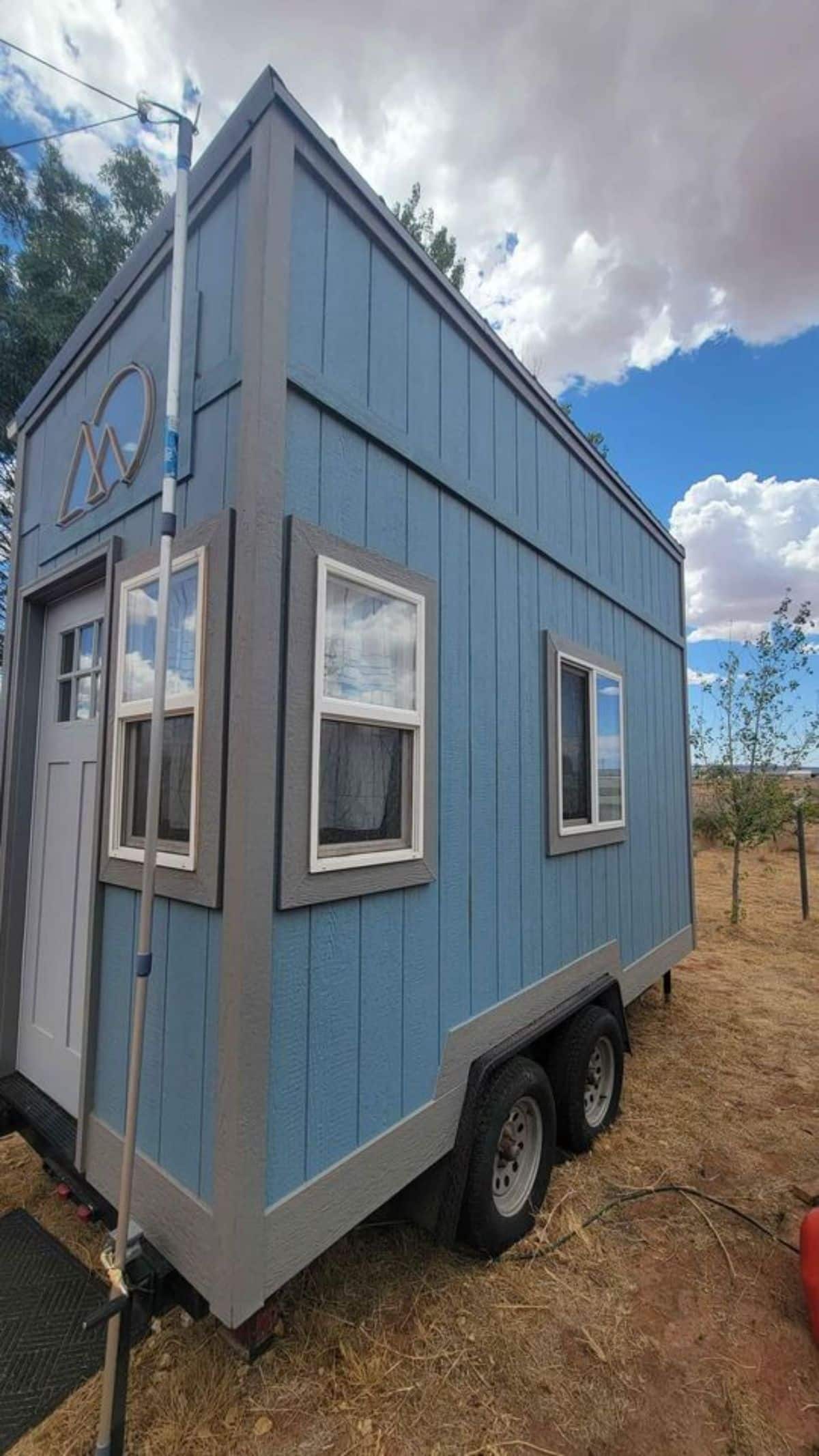 Huge windows all over the 14’ compact tiny house