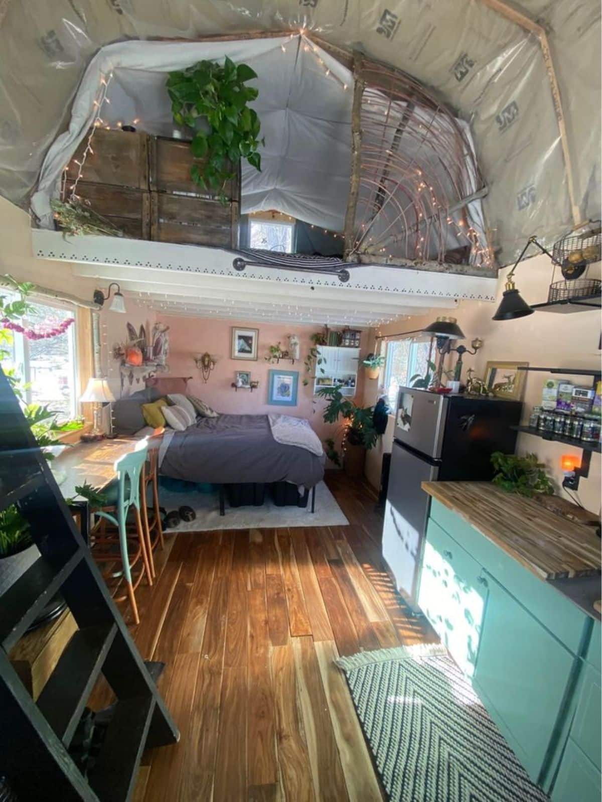 Wooden interiors of of 20’ barn style tiny home
