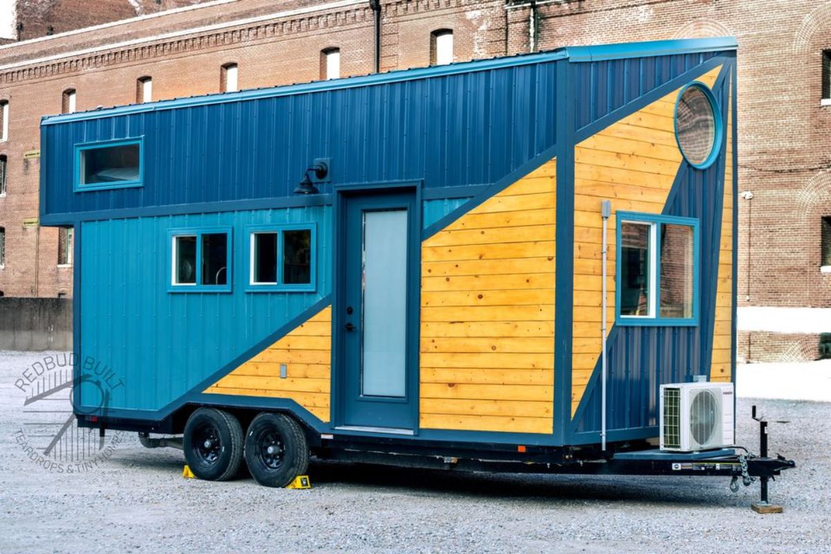 Blue and yellow exterior of artisan tiny home