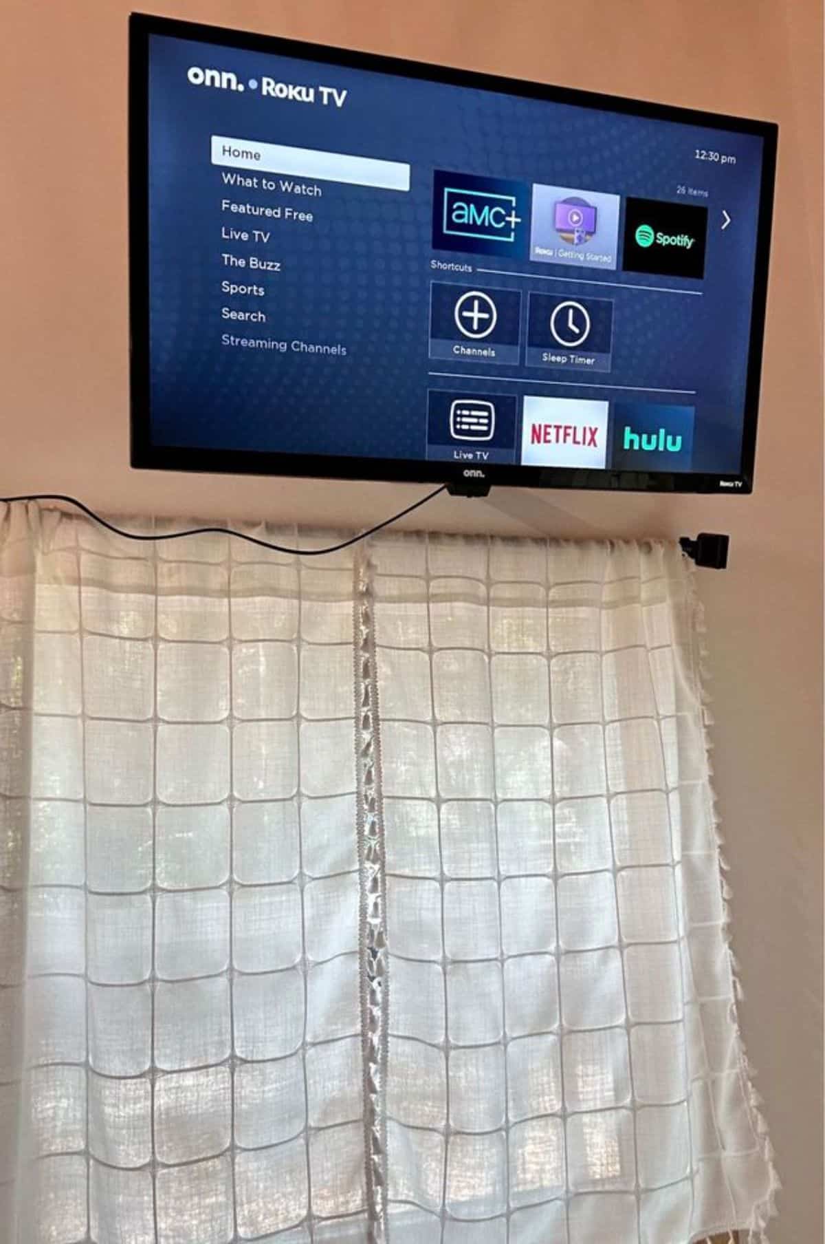 Roku TV is installed in the bedroom