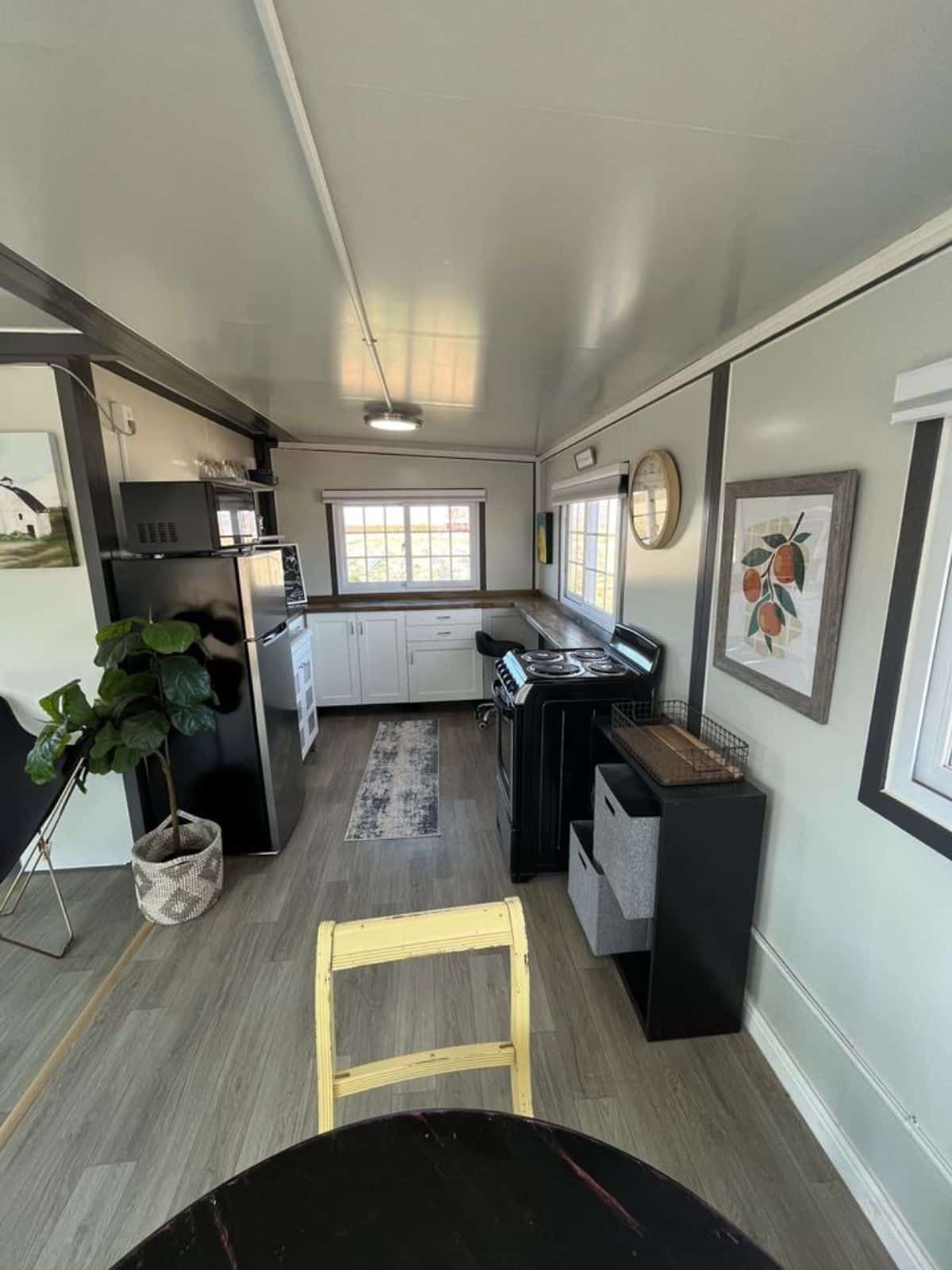 Kitchen area view of 20’ unique tiny home