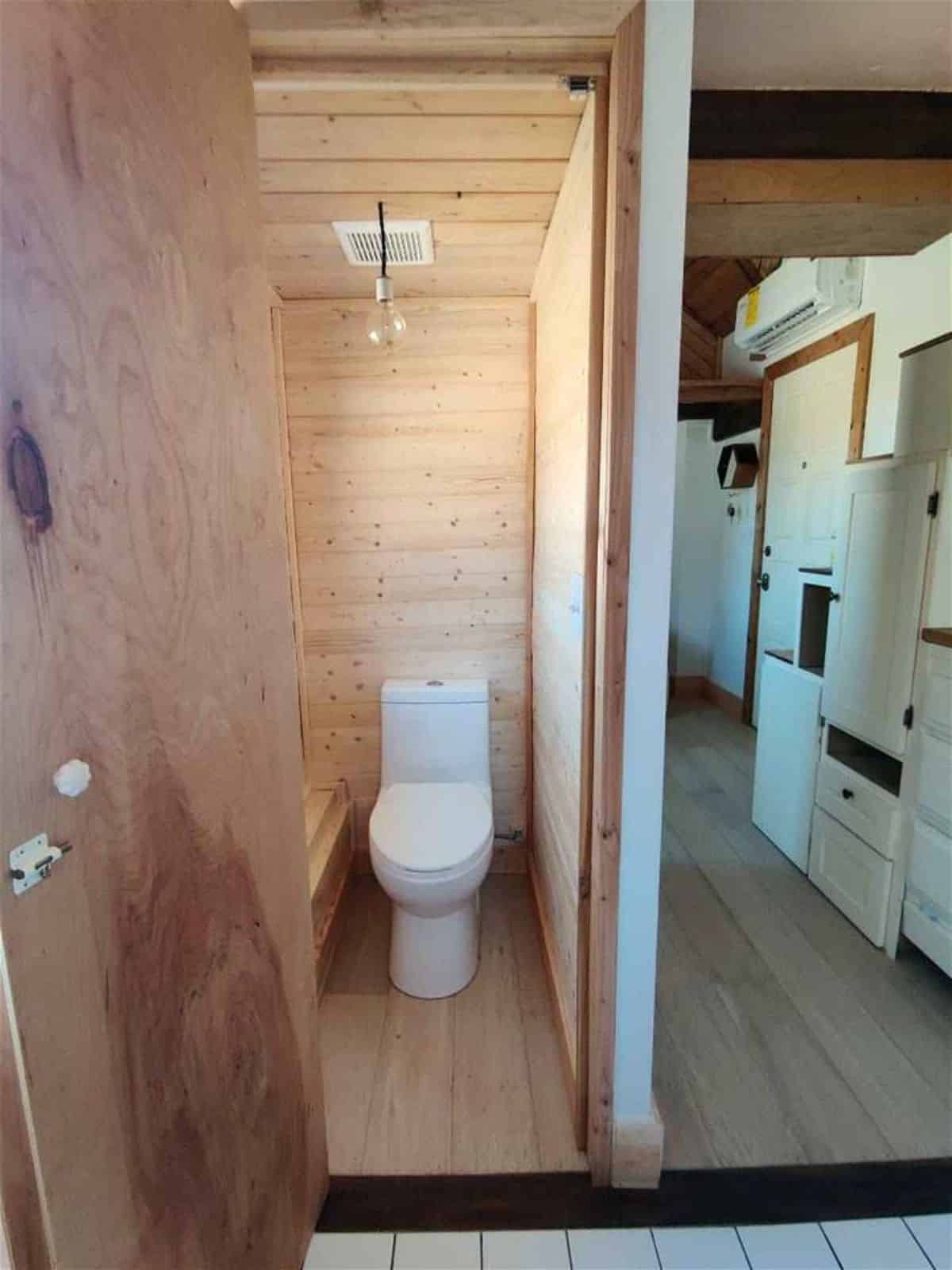 Standard toilet with standard fittings in bathroom
