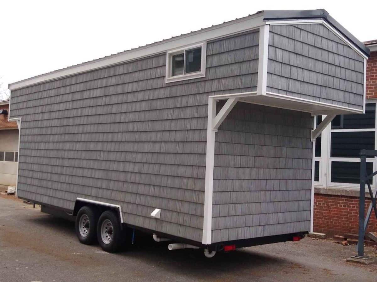Gray exterior of 24’ custom tiny house