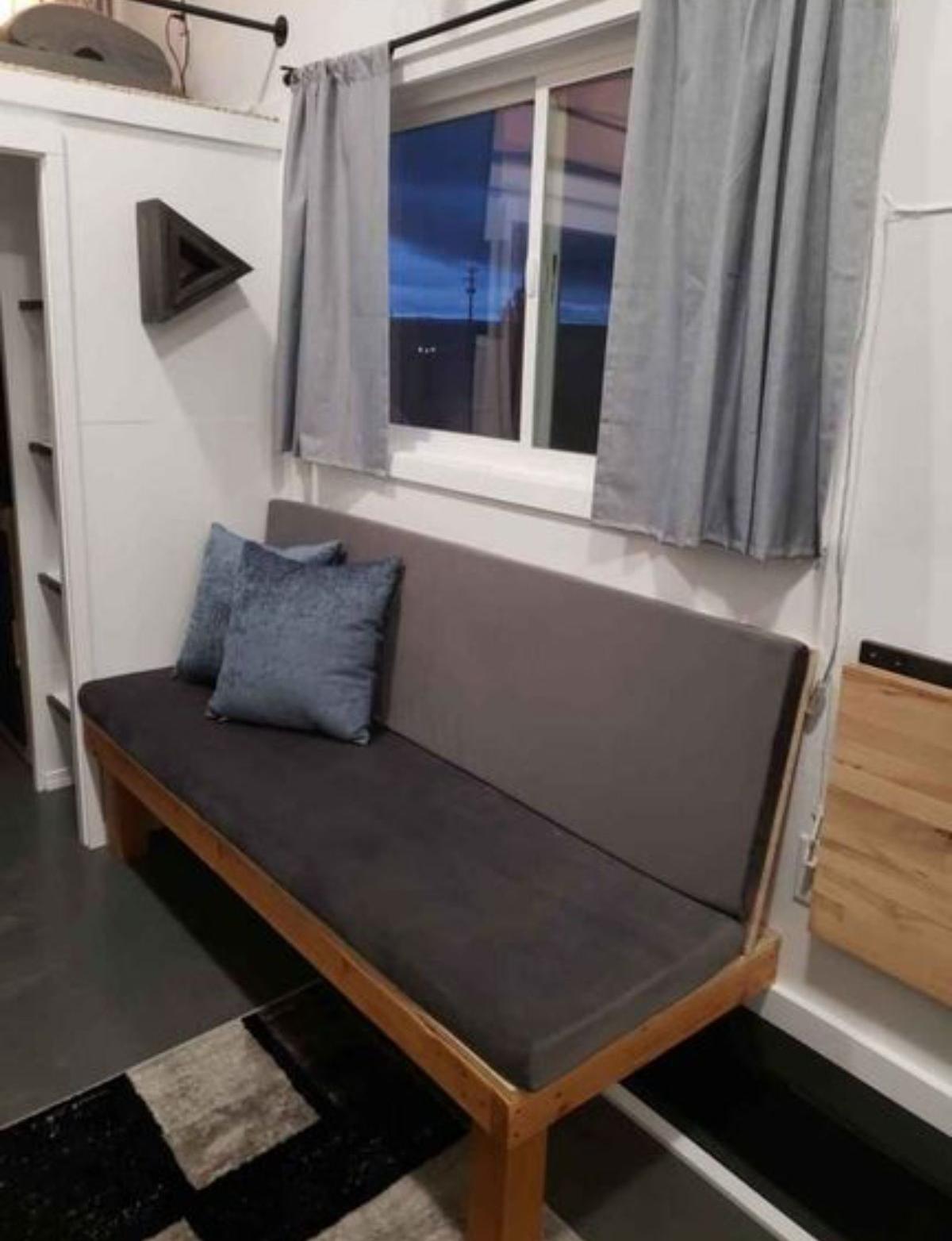 Living area of double-lofted tiny home