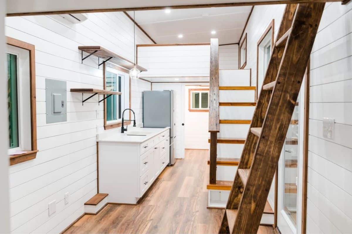 Full white interiors of 34’ custom built tiny home