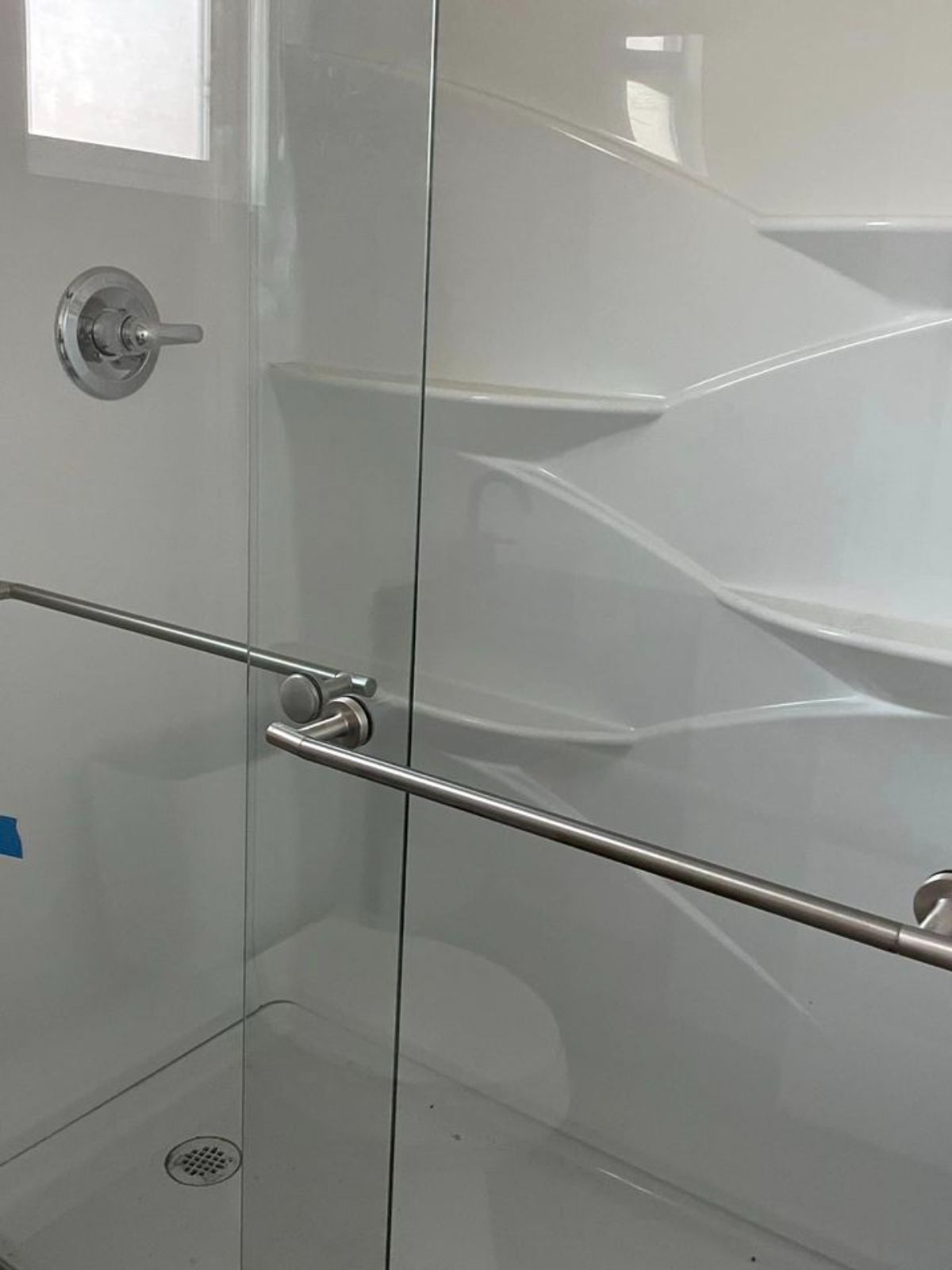 Glass door in shower area