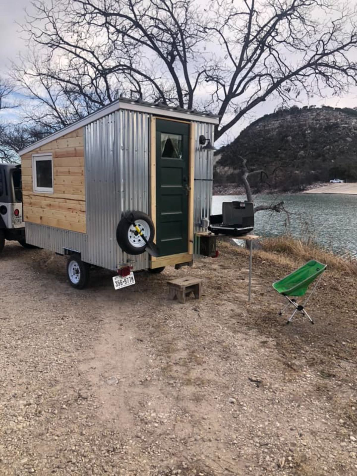 Full long view of lightweight tiny home from outside