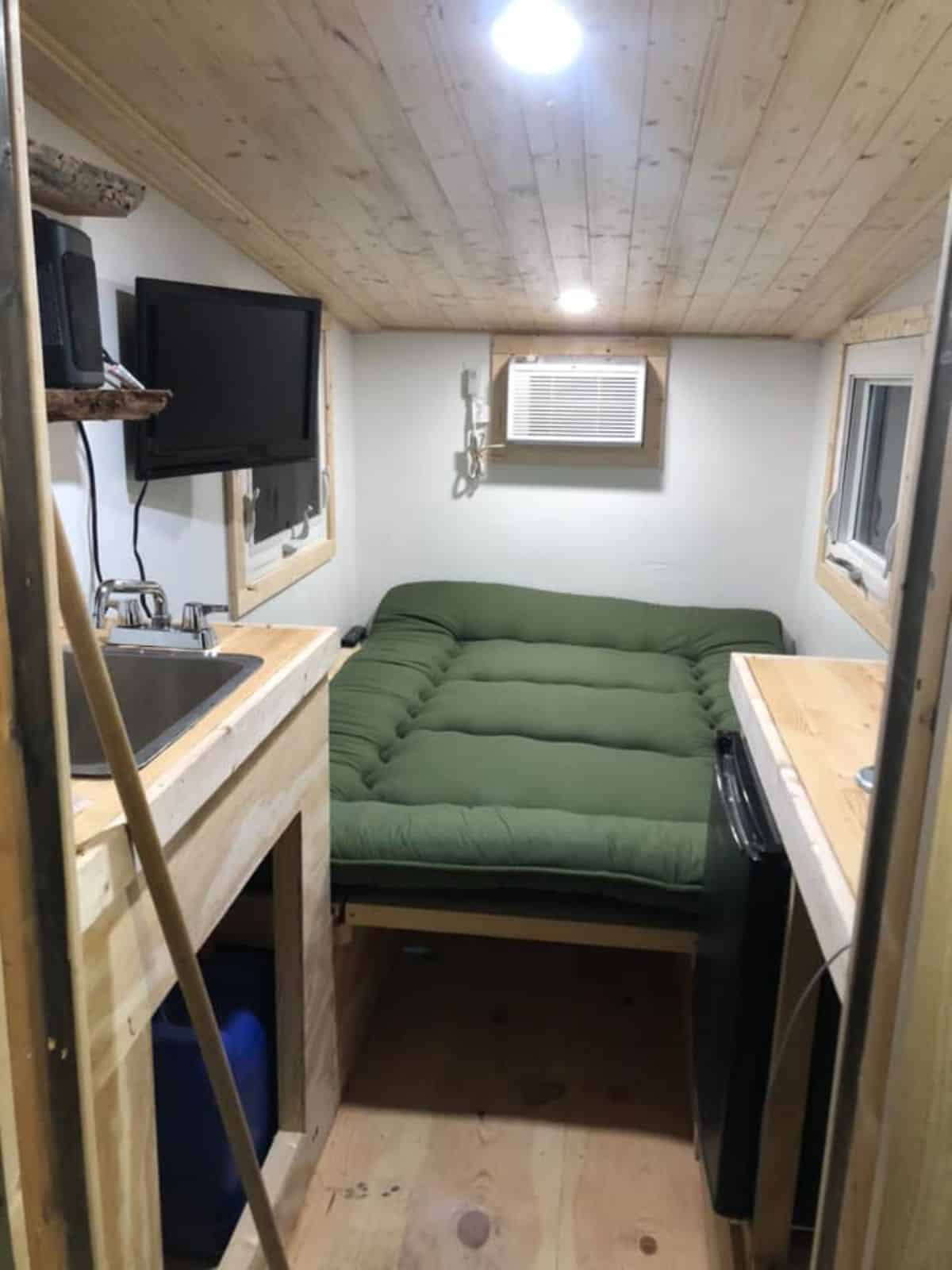 Convertible sleeping cum living area of lightweight tiny home