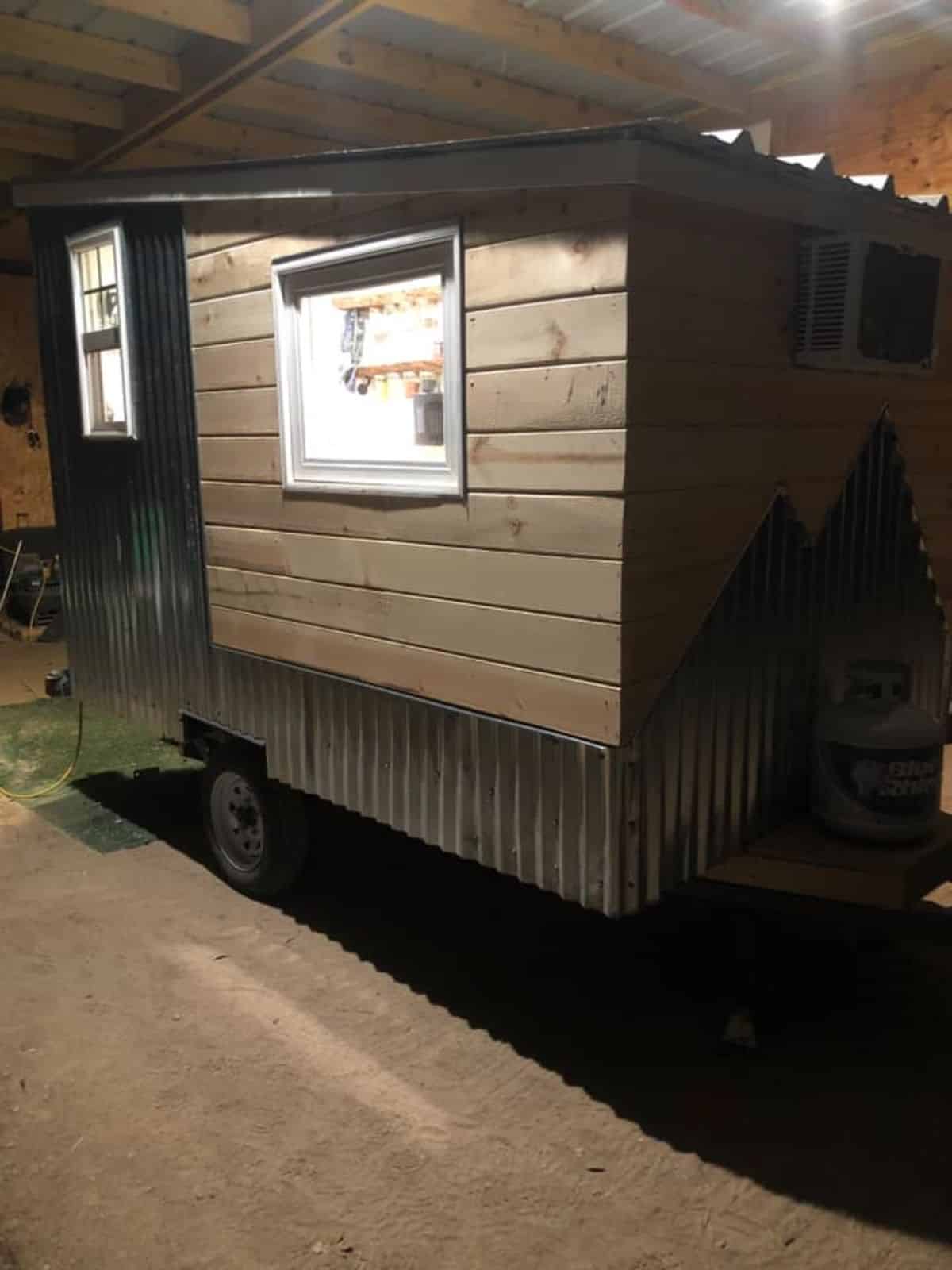 Side view of lightweight tiny home from outside
