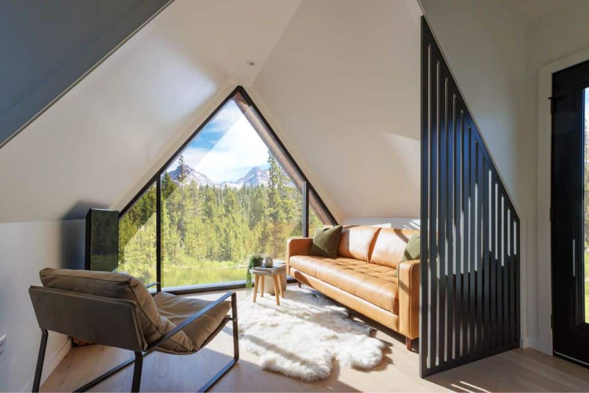 Classic and comfortable living area of A-frame tiny home