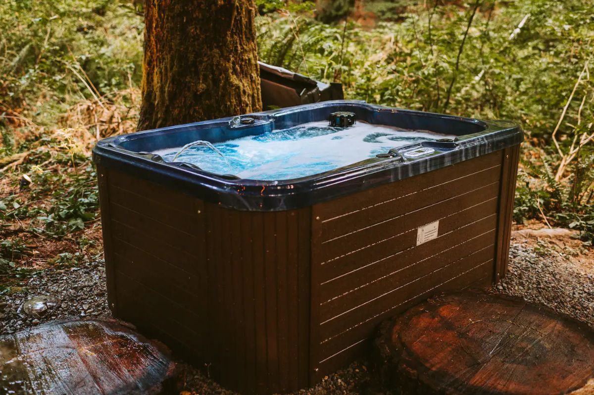 hot tub in woods under house