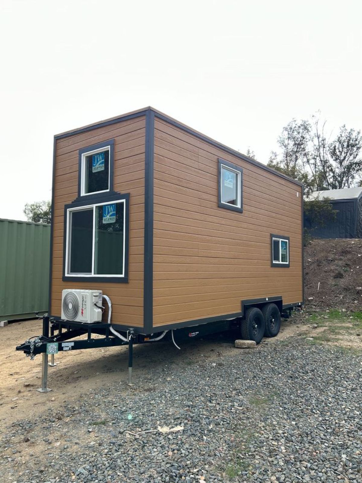 Brown wooden exterior of brand new tiny home