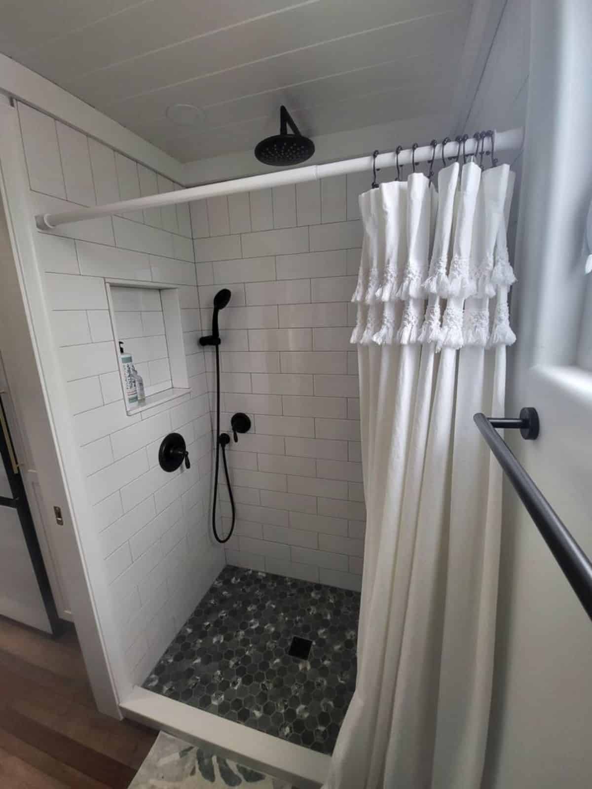 Amazing tiled shower area in bathroom