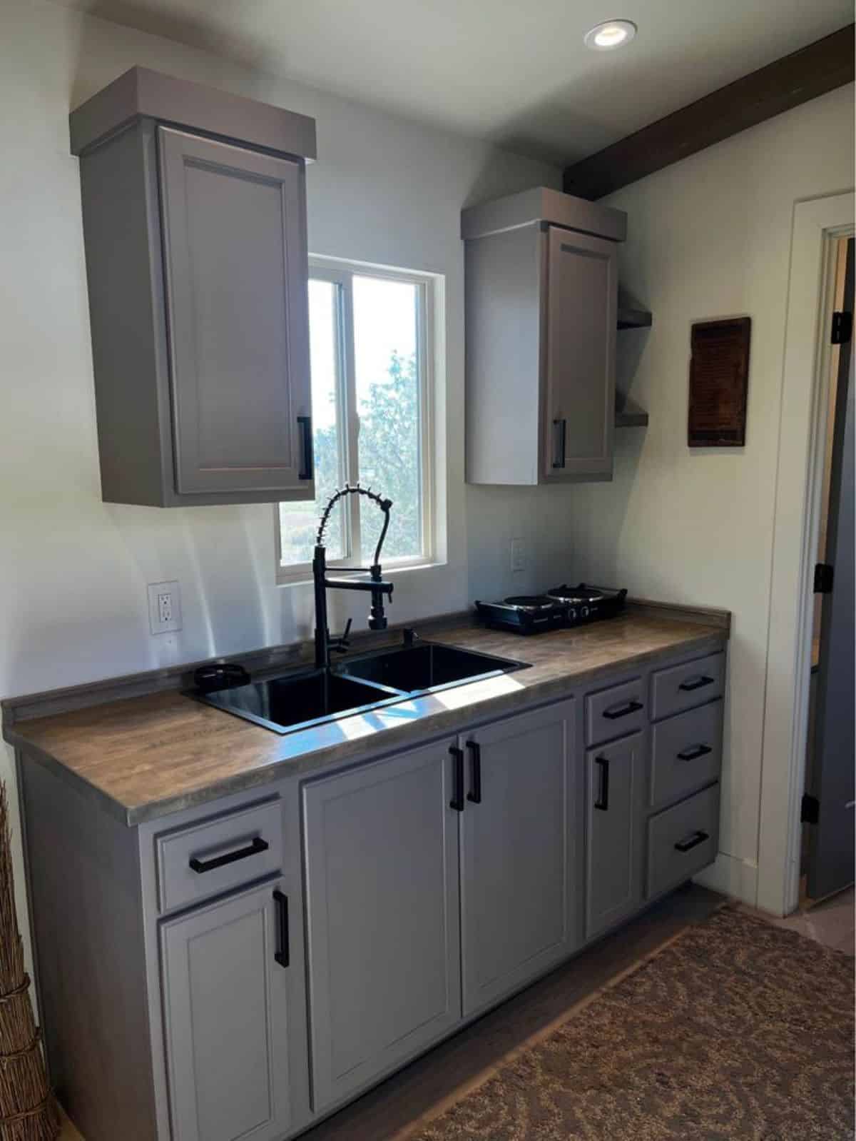 Kitchen area of exquisite tiny home