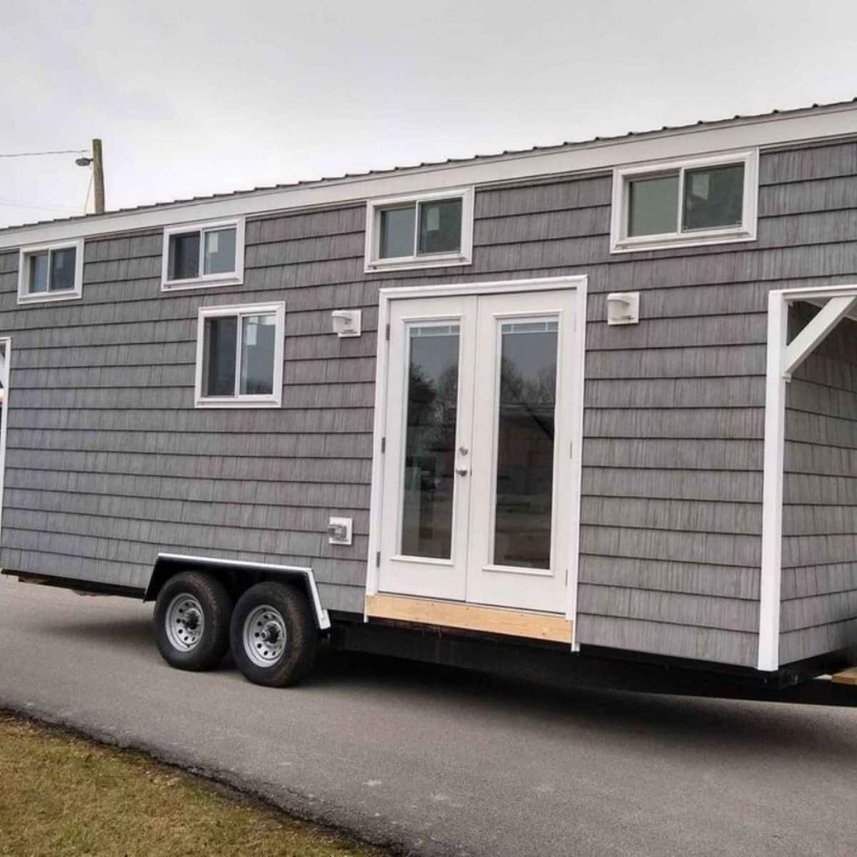 24' Custom Tiny House Includes Two Lofts And Appliances
