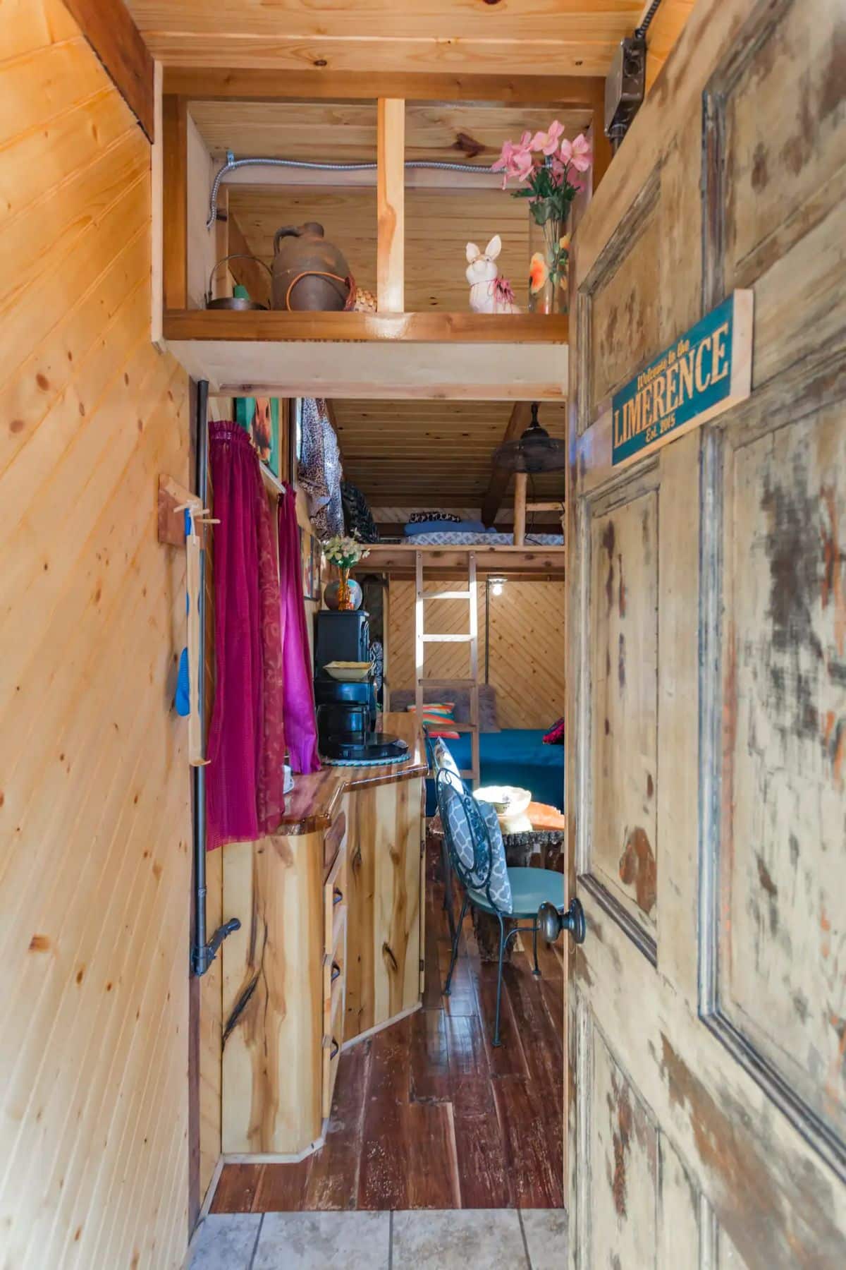open door leading into the rustic tiny home