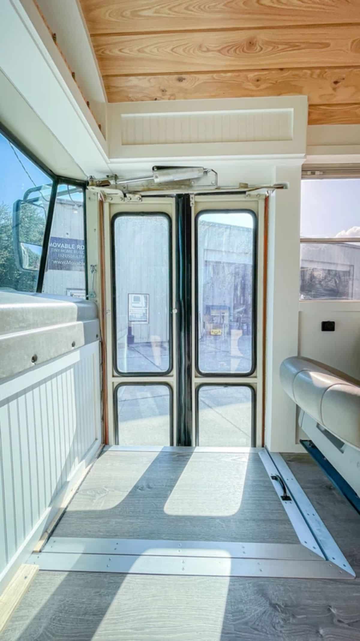 doors to bus from captains chair