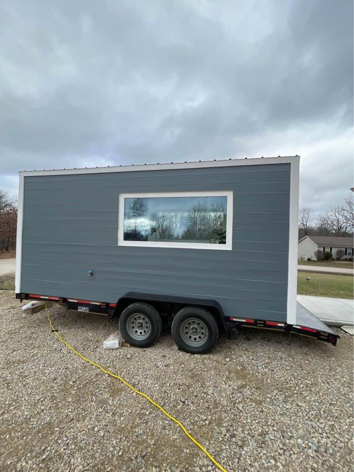Side view of mobile tiny house from outside