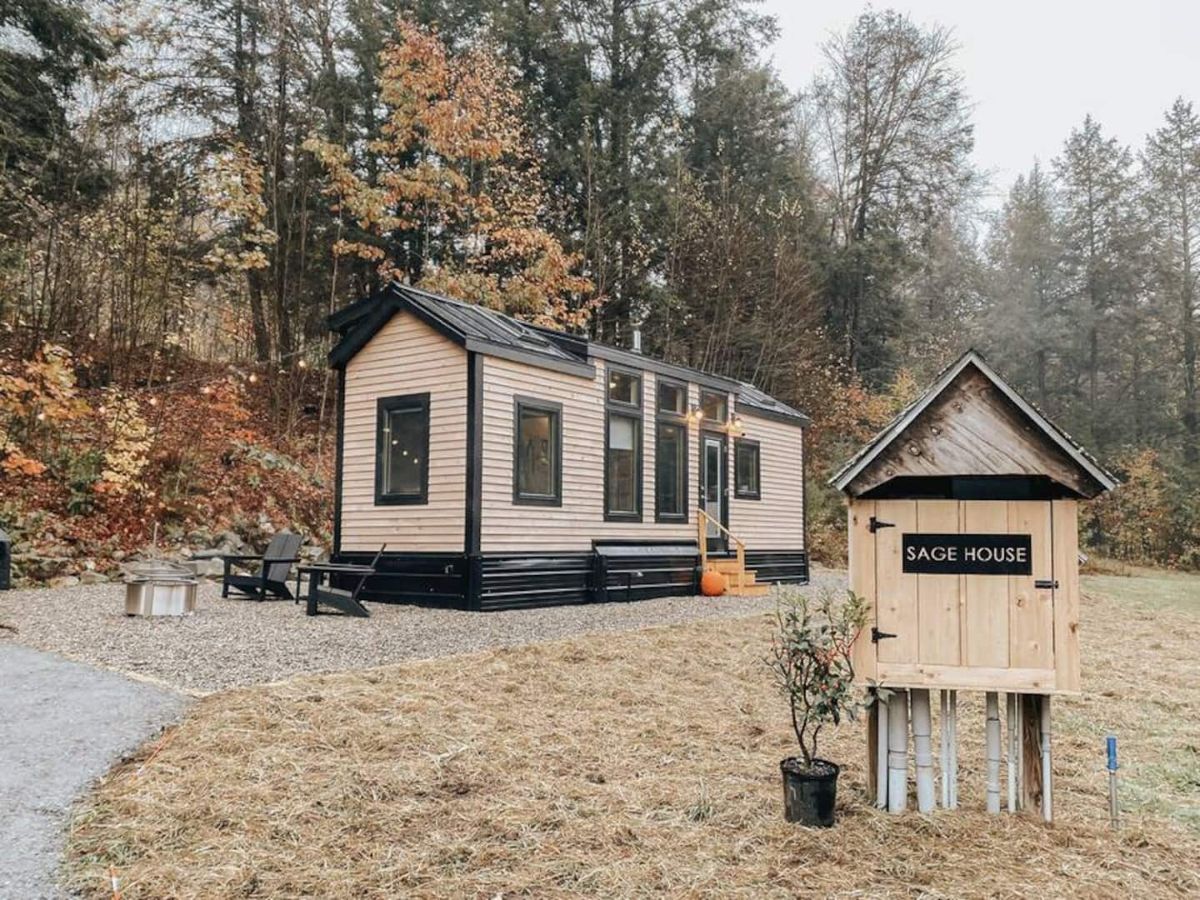 tiny home with address sign to the right