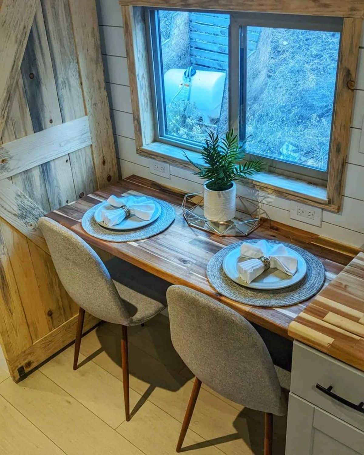 Dining area with 2 chairs of tiny home in Arizona