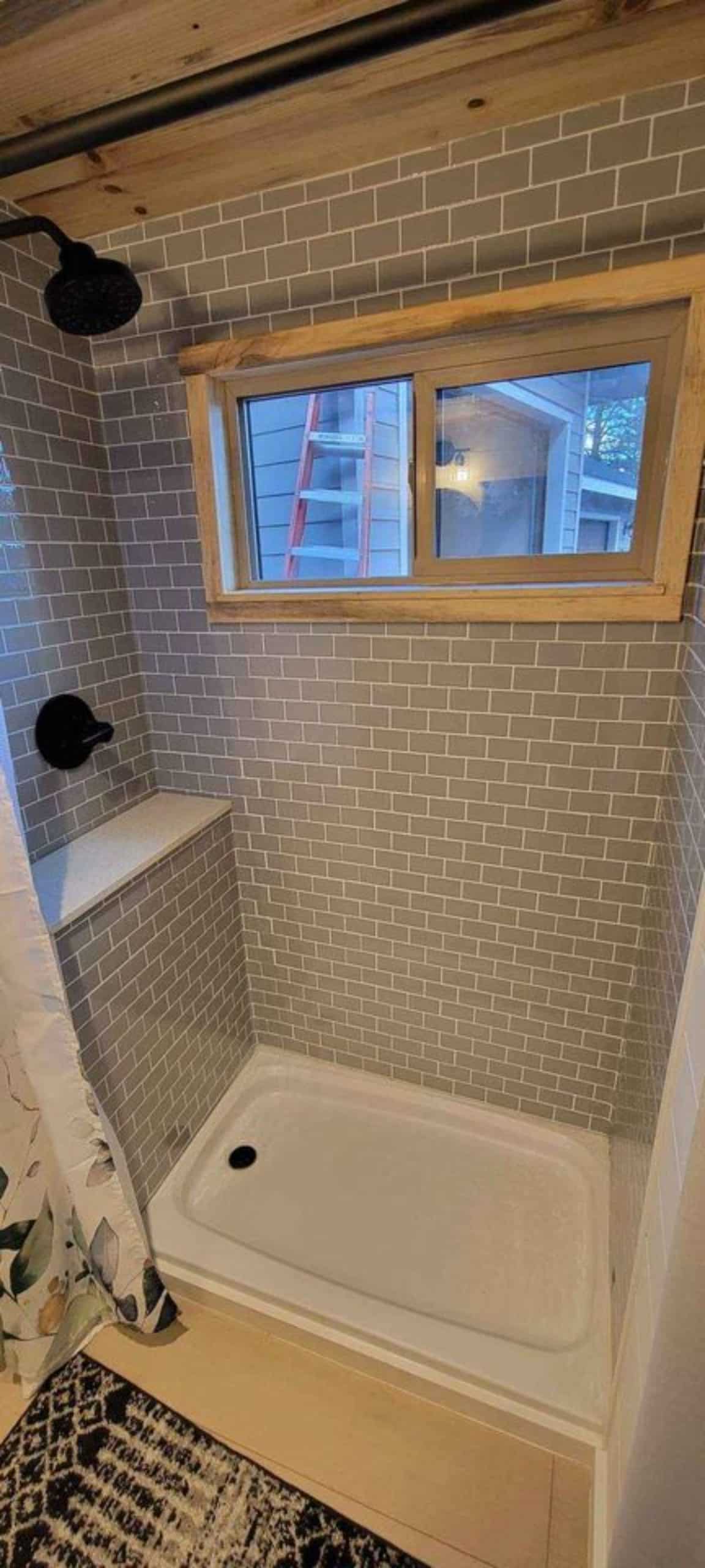 Separate shower area in bathroom of tiny home in Arizona