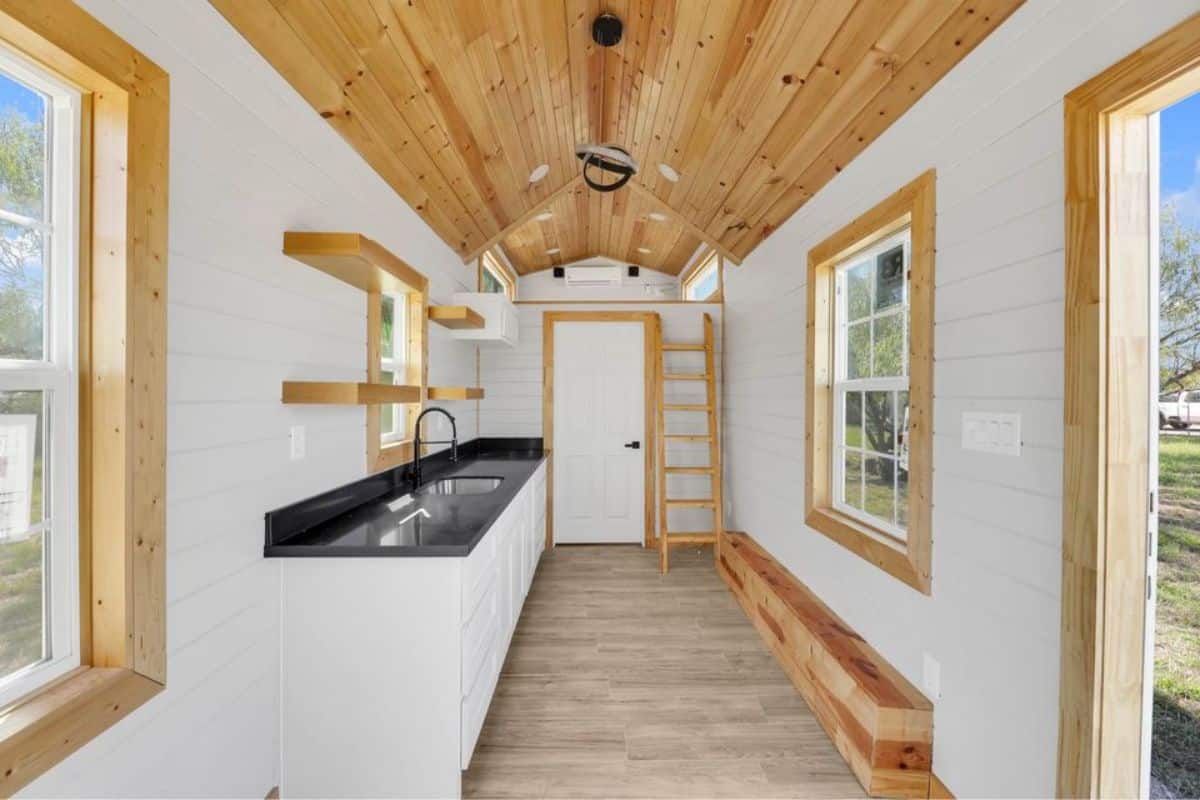 Interiors and vinyl flooring of tiny towable home