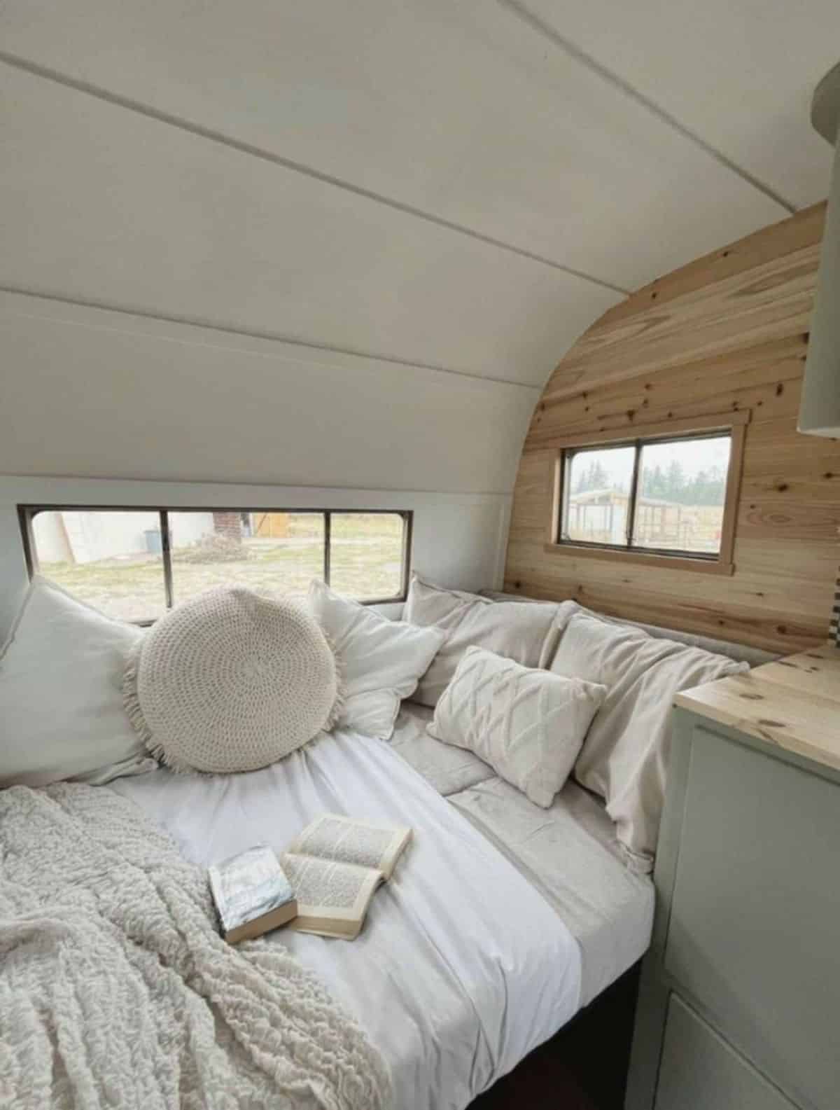 Second bed on the opposite walls of renovated tiny home