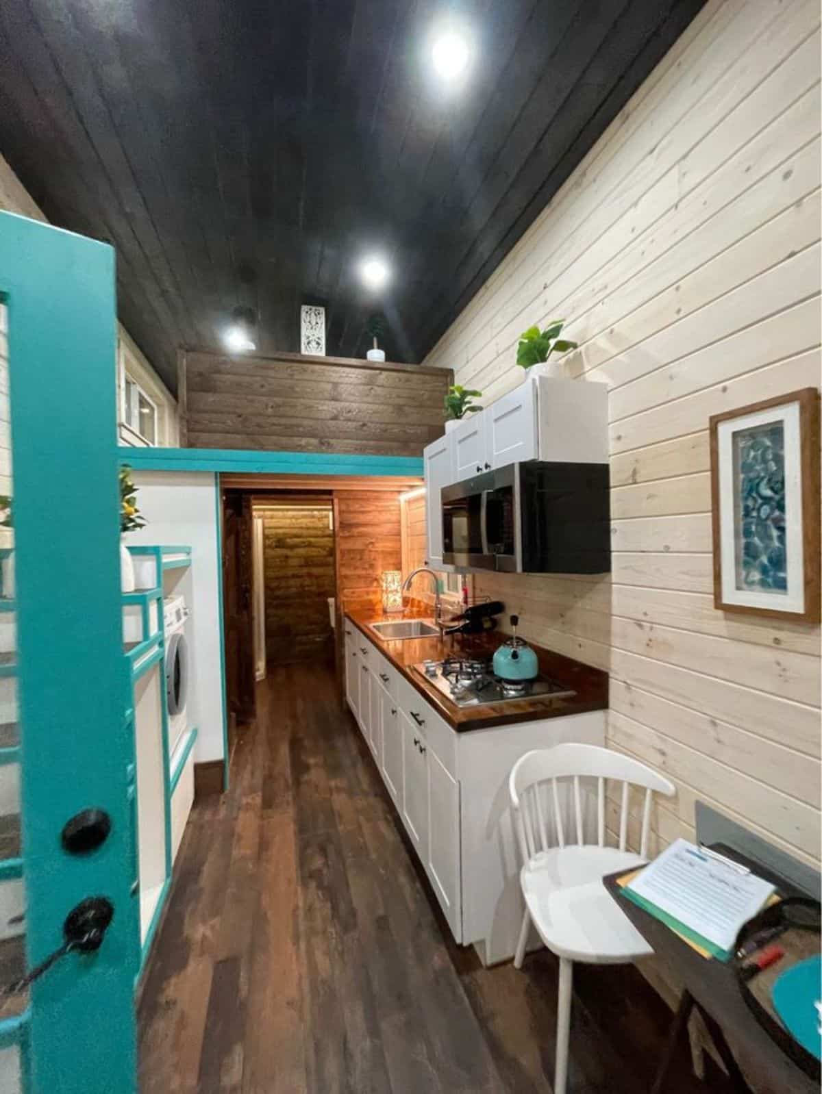 White interiors of wooden tiny home