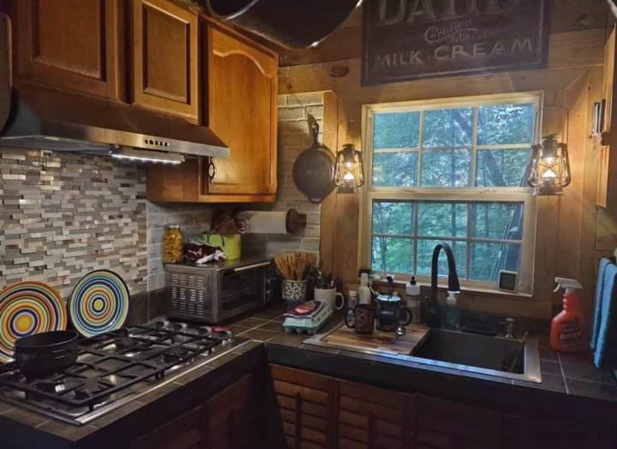 Ray’s Cabin Off-the-Grid Tiny House kitchen area.
