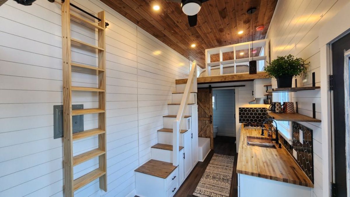 stunning white and brown interiors of 2 bedroom tiny home