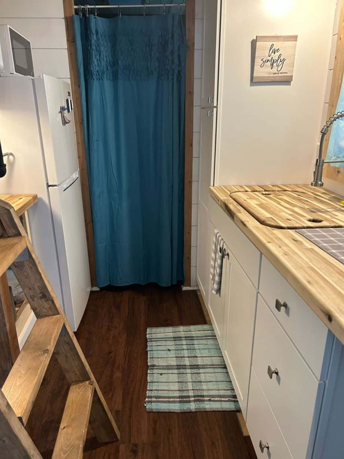 Wooden interiors of affordable 2 bedroom tiny home