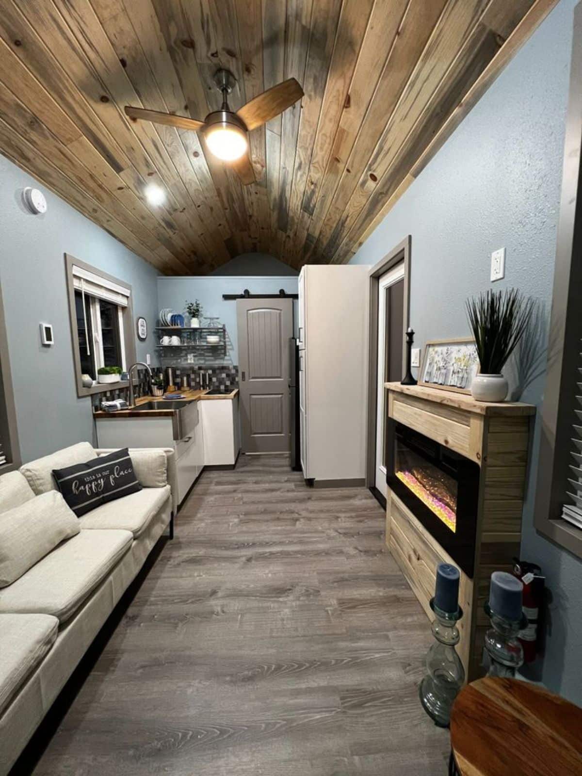 stunning interiors of tiny home with downstairs bedroom