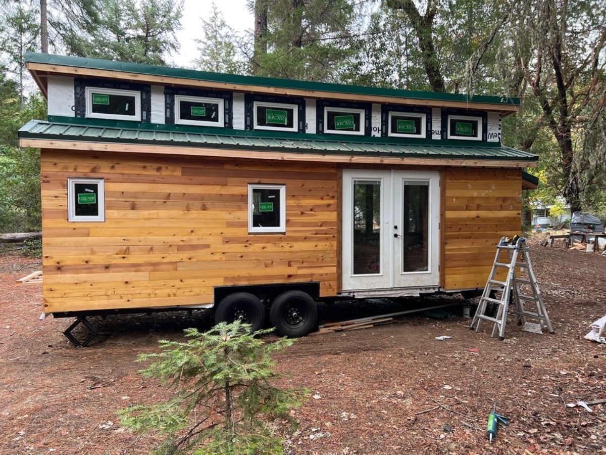 Main entrance view of trailer-built tiny home