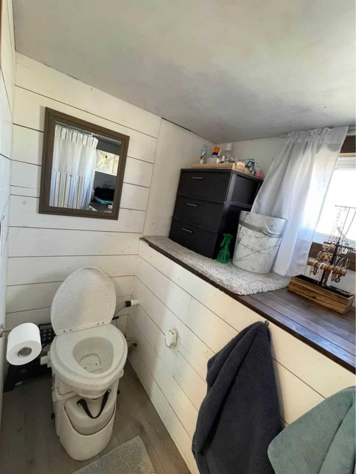bathroom of tiny home for a couple has all the standard fittings
