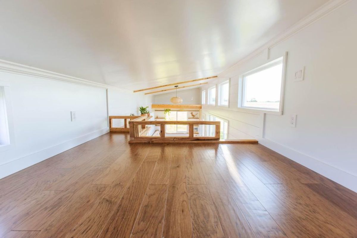 Huge wooden vinyl flooring loft of one bedroom tiny home