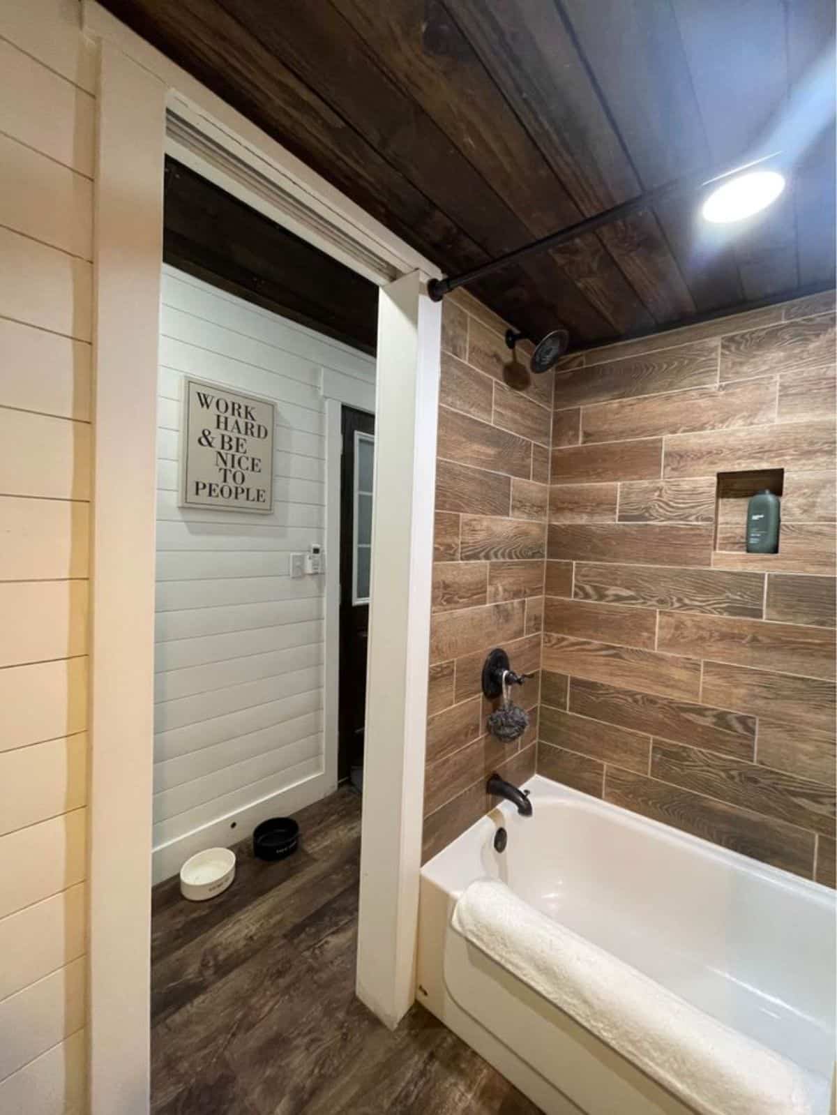 bathtub included in the bathroom