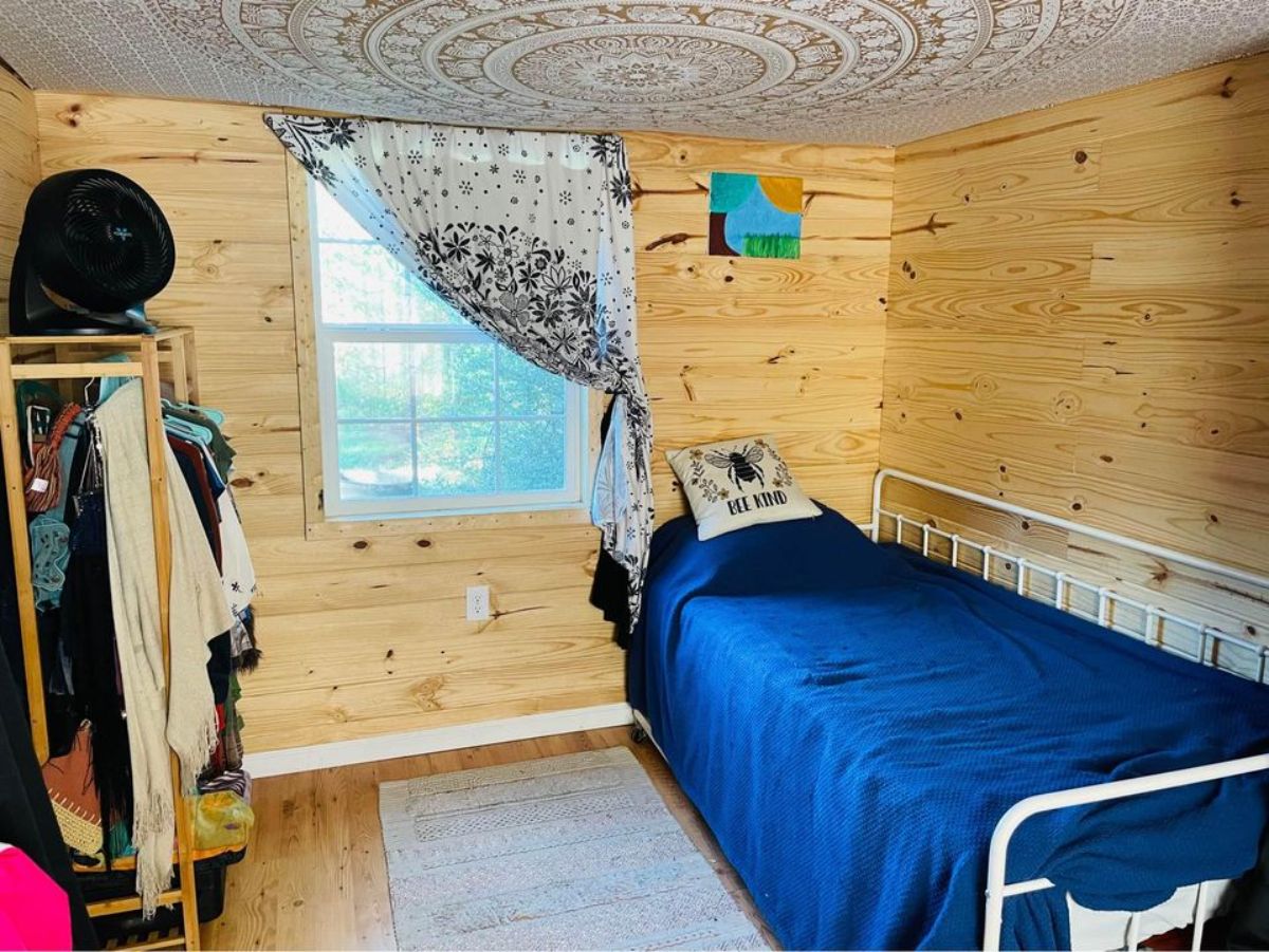 main floor bedroom of affordable 3 bedroom tiny house