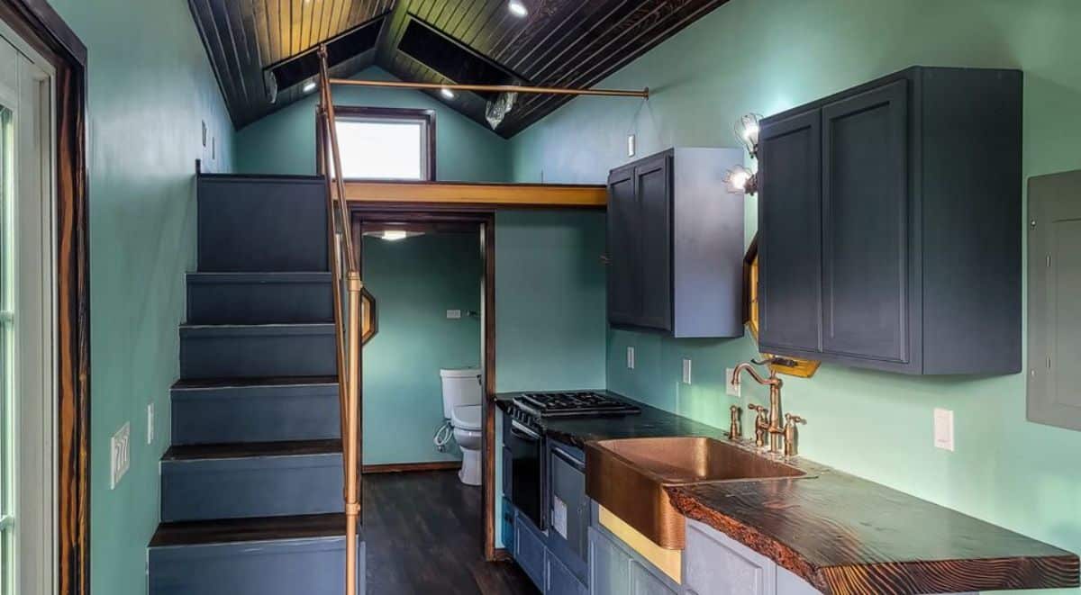 amazing blue and gold interiors of custom tiny home