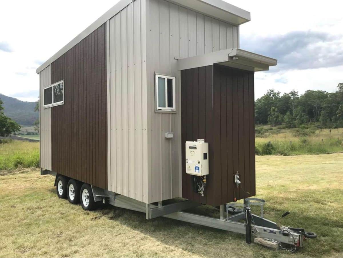 Backside view of furnished tiny house from outside