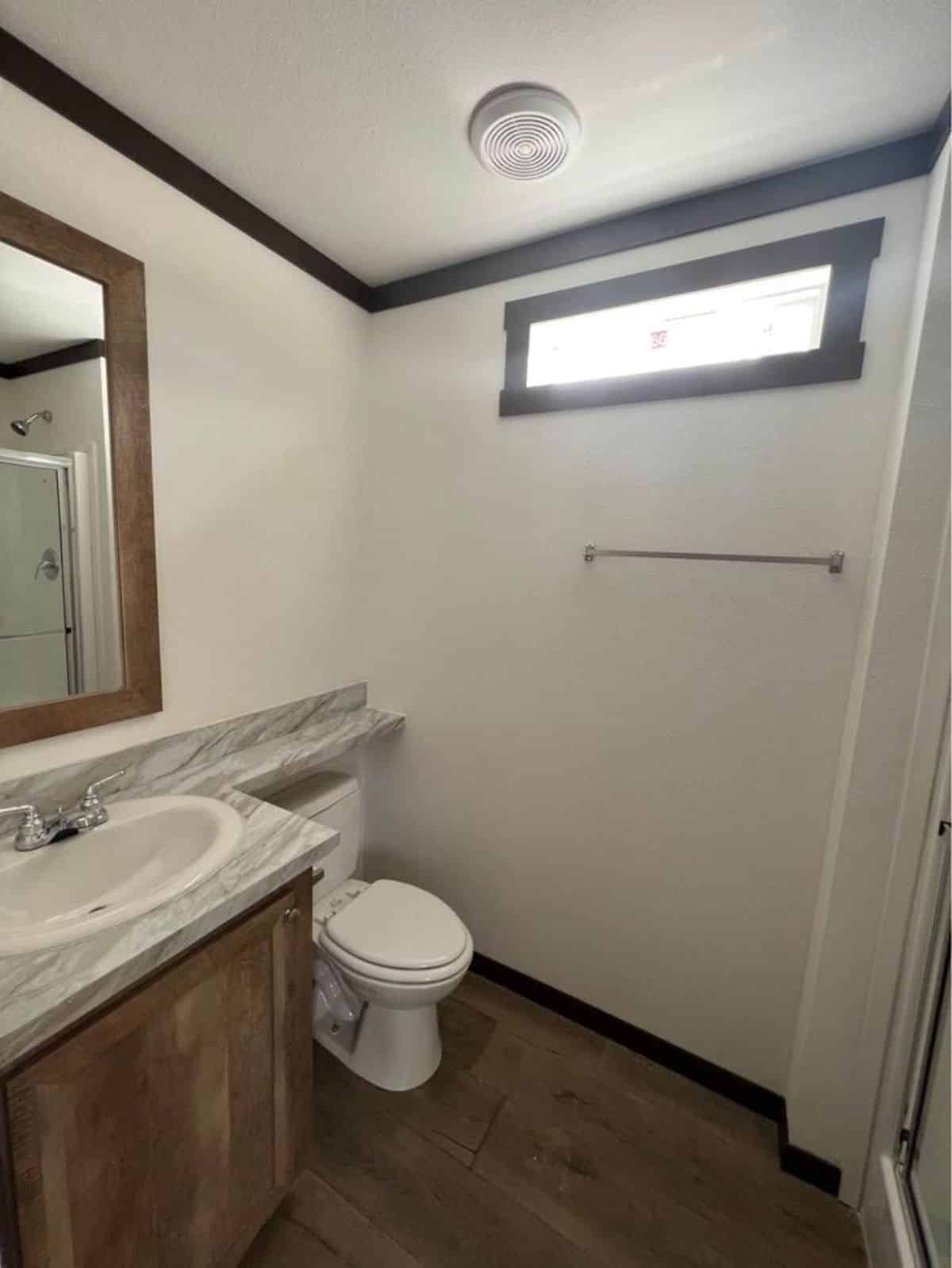standard fittings in bathroom of one bedroom tiny home