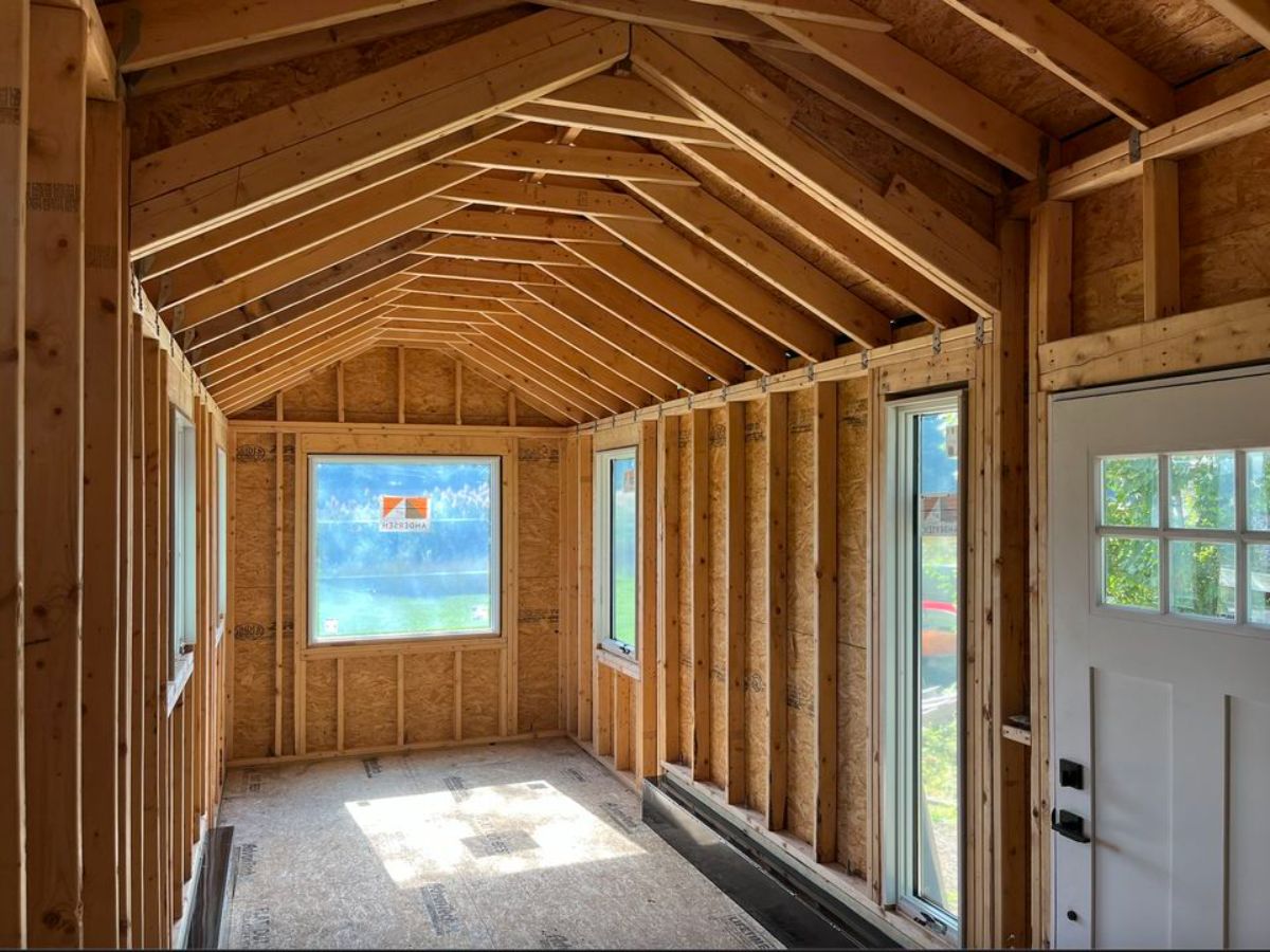 Huge windows all over the professionally built tiny home