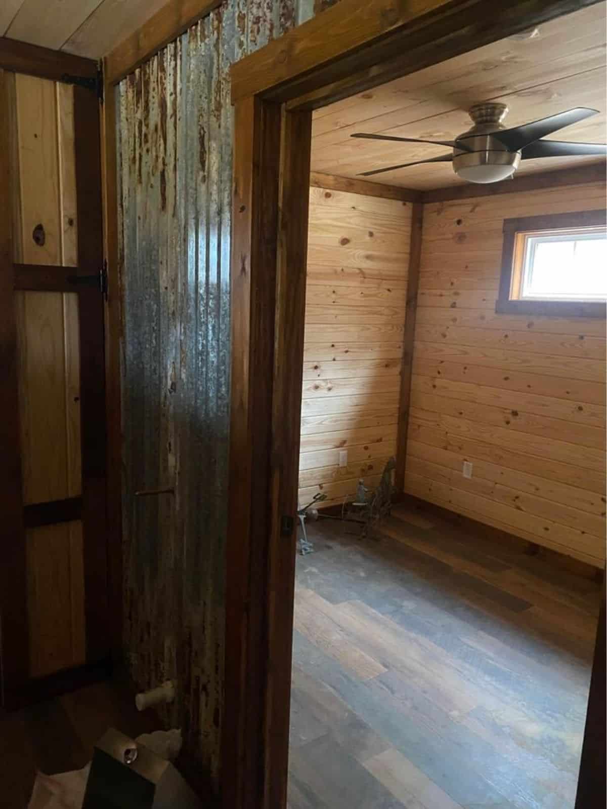 bedroom area of two story cabin home